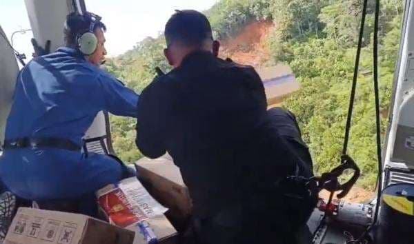 Polri Lanjutkan Distribusi Bantuan Bencana Banjir ke Taput dan Tapteng Lewat Airdrop