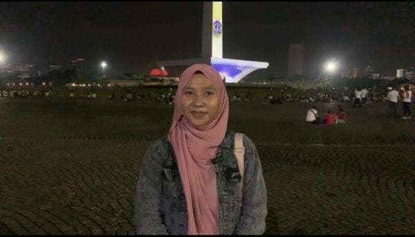 Antusiasnya Warga Sambut Tahun Baru di Monas meski Tanpa Kembang Api