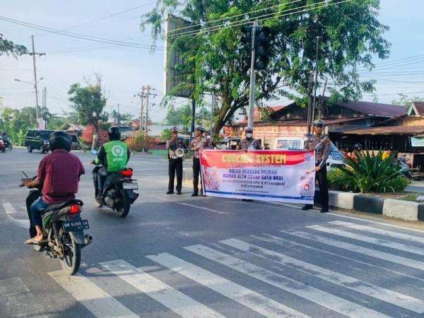 Satlantas Pekanbaru AjakGuru Dukung Pilkada Damai