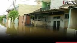 Tanggul Jebol, Banjir Rendam Perumahan Garden City