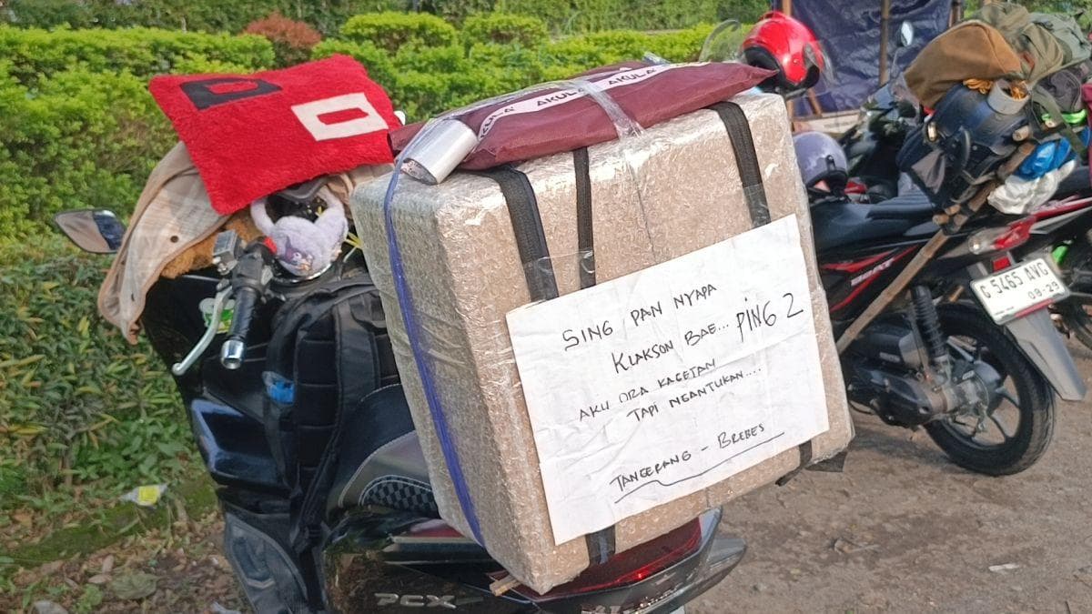 Mudik Motor Bareng Anak, Pemudik Ini Pasang Pesan: Klakson Dua Kali Kalau Saya Ngantuk Mudik Motor Bareng Anak, Pemudik Ini Pasang Pesan: Klakson Dua Kali Kalau Saya Ngantuk