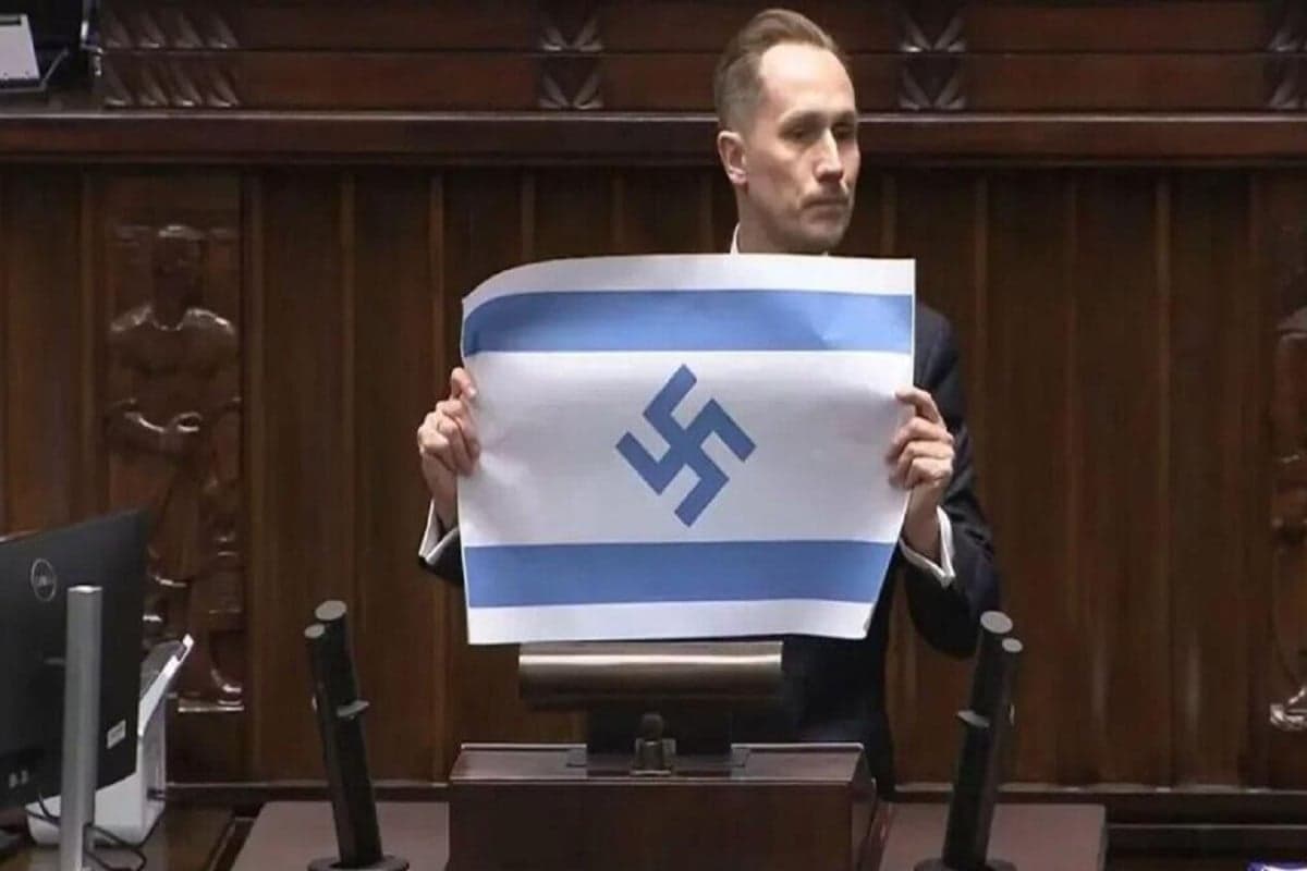 Anggota DPR Polandia Angkat Bendera Israel dengan Simbol Nazi, Rezim Zionis Murka Anggota DPR Polandia Angkat Bendera Israel dengan Simbol Nazi, Rezim Zionis Murka